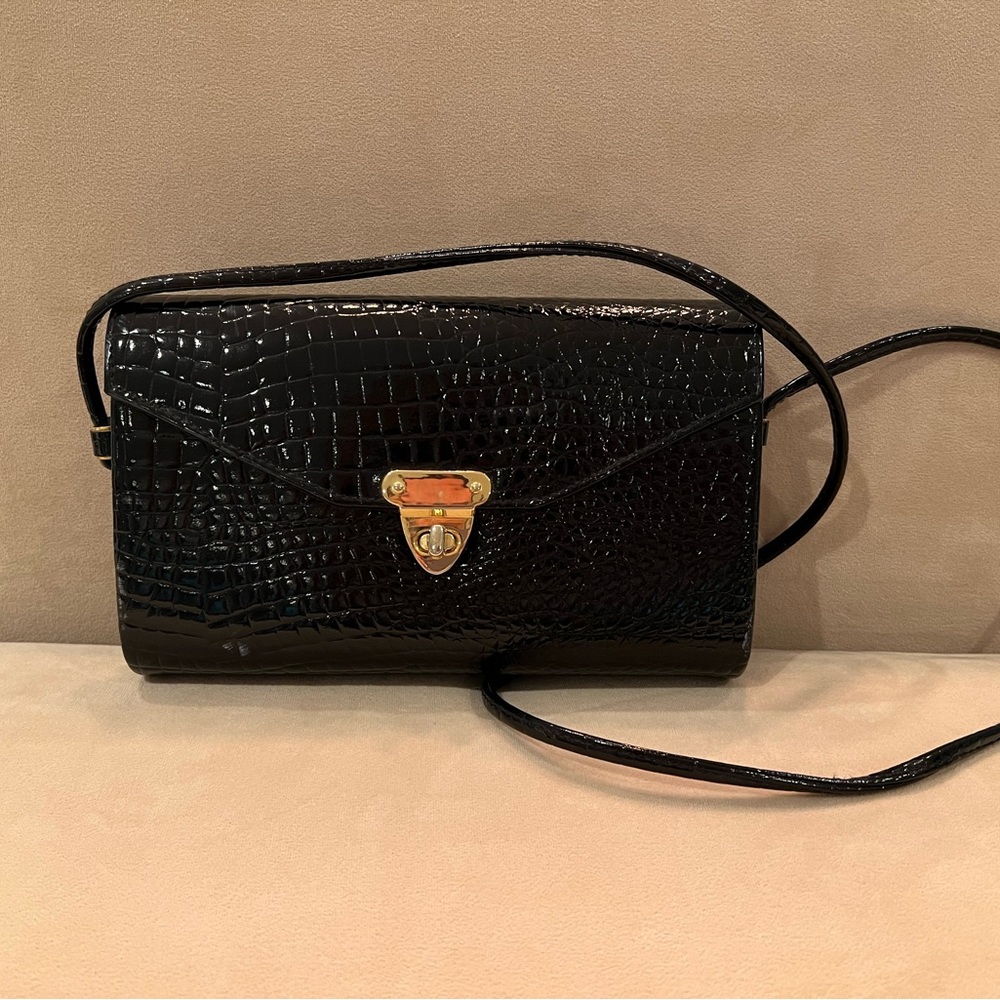 TIMELESS and CLASSIC Black “snake skin” purse with gold closure